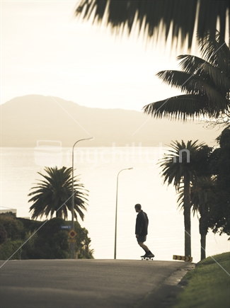 Skateboarder at top of a hill; St Heliers Auckland