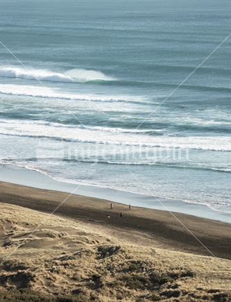 Bethells Beach sand and surf, Auckland (High ISO)