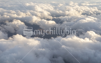 clouds and mountain view from plane