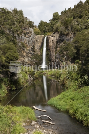 Hunua Falls waterfall reflection, Auckland (distant small person)