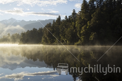 Lake Matheson; dawn bush reflection.