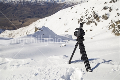 Video camera in backcountry snow scene