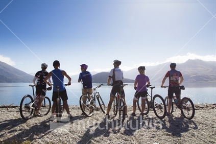 Mountain bikers taking in the view, West Wanaka