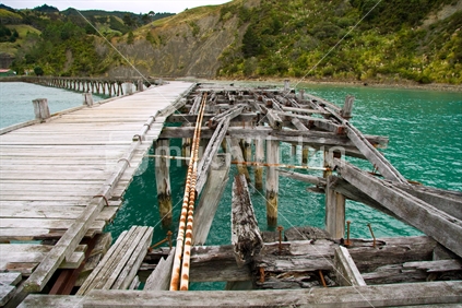 Old wooden wharf at Waima, Tokomaru Bay, East Coast, North Island, New Zealand