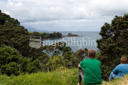 Couple enjoying view at entrance to Leigh Harbour
