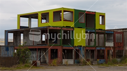 Shipping Containers remodelled, and cut out to be used as dwellings or shops.