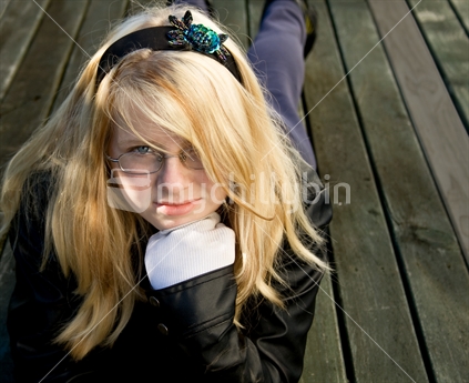 Blonde girl on a deck