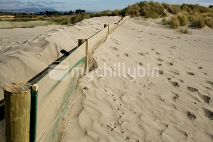 Sand dunes and fence