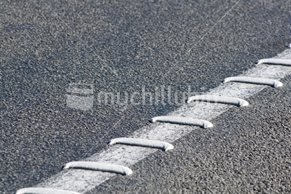 Rumble lines on the edge of a New Zealand road surface