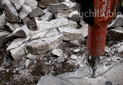 Concrete path broken up by a jackhammer