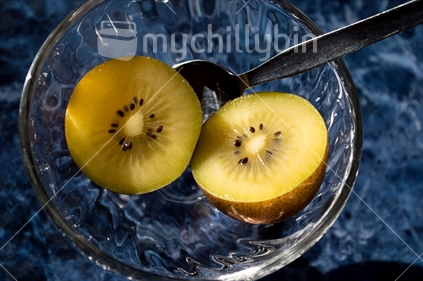 Gold kiwifruit, halved