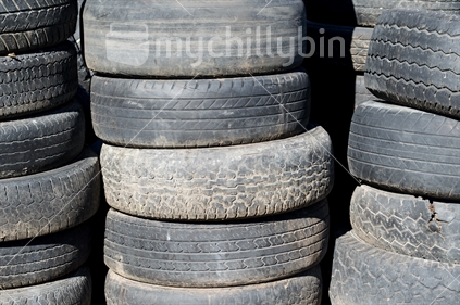 Stacks of old car tyres