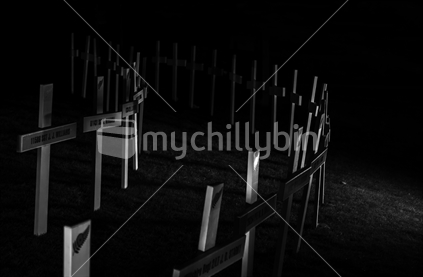 ANZAC Day crosses illuminated at night