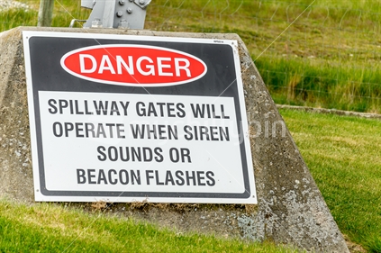 Danger sign for a dam - flashing light and siren