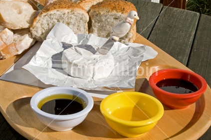 Platter of bread, cheese and dips