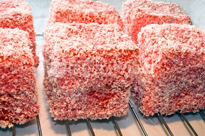 Homemade Lamingtons on wire rack