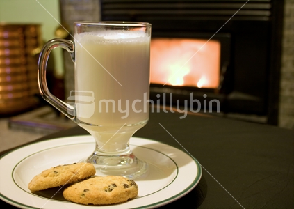 Hot milk and cookies in front of the fire