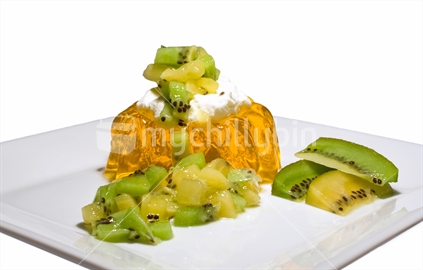 Jelly with kiwifruit on white plate