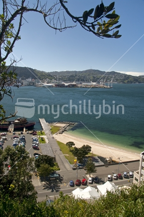 Freyberg beach, Oriental Bay, Wellington; over the pier and wave platform towards the container wharf