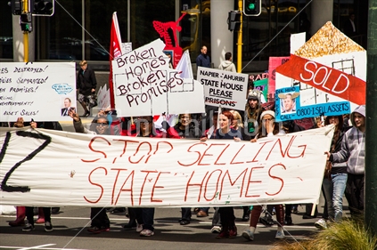 Protesters march through the streets of Wellington to Parlaiment to protest over the sale of state houses as part of an urban renewal project; Nov 2012