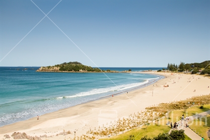 The sweep of sandy surf beach at Mount Maunganui