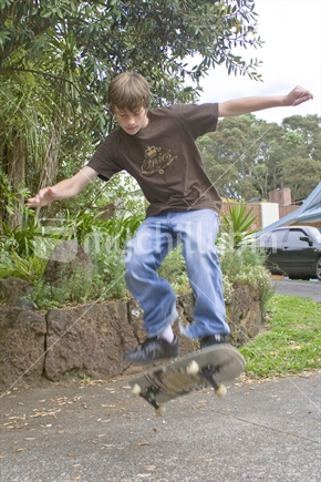 Teenage boy on his skate board
