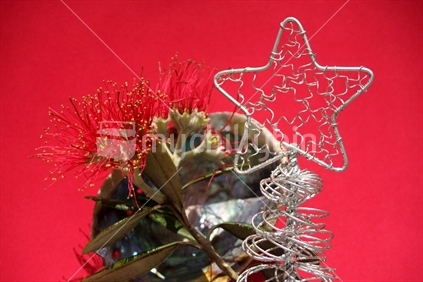 Christmas star with a Pohutukawa branch and paua