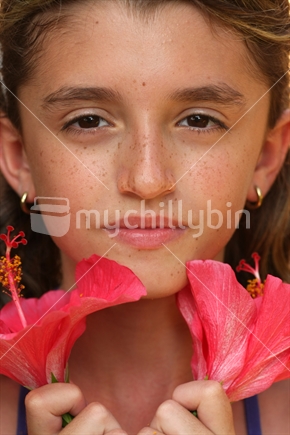Girl with hibiscus flowers
