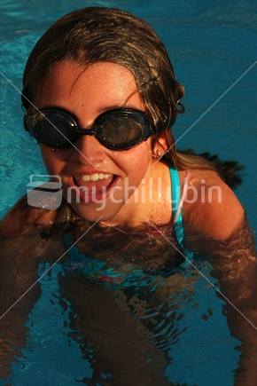 Girl playing in a pool