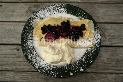 Cafe, serving crepes with New Zealand blueberries, with fresh whipped cream on outdoor tables. No 2. 