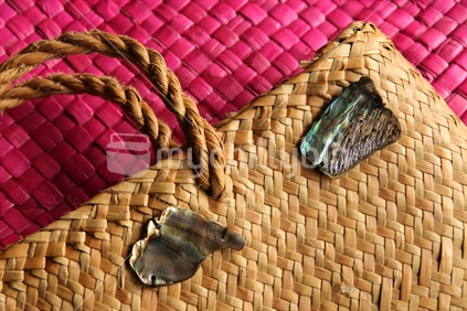 hand woven kete with paua shells