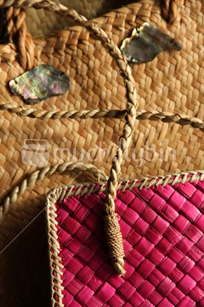 Hand woven kete with New Zealand paua shells.

