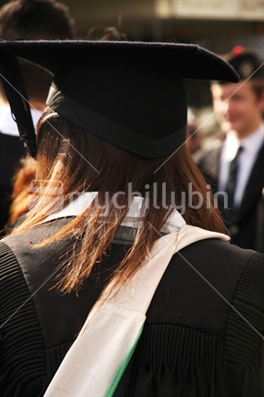 Female university graduate, at Auckland graduation ceremony.
