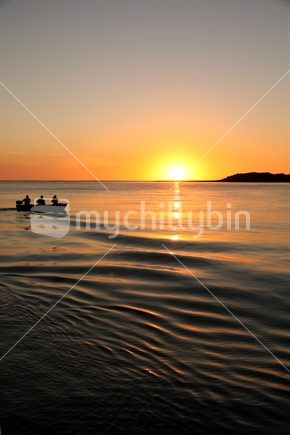 Silhouette of a dinghy at sunset, Raglan, Waikato