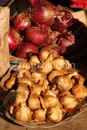 Fresh garlic and onions in a farmer's market
