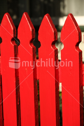 Picket fence - thick red paint. 