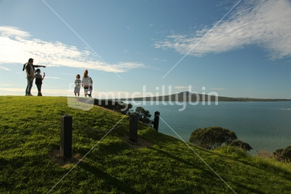 Visitors looking at Rangitoto Island from North Head, Devonport, North Shore, Auckland