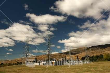 Powerlines at Aviemore Dam, border of Otago and Canterbury, part of the Waitaki River Hydroelectric System, South Island