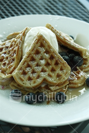 Heart shaped waffles with NZ blueberries and vanilla icecream