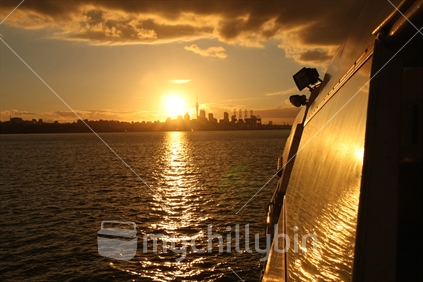 Sunset over Auckland, seen from a ferry on the harbour.