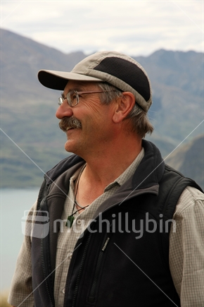 Man outdoors wearing a pounamu pendant
