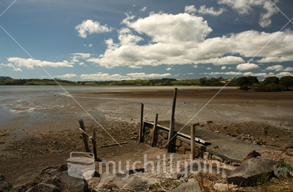 Small rotten jetty at low tide, Mangonui, Northland