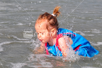 Girl falling in water.