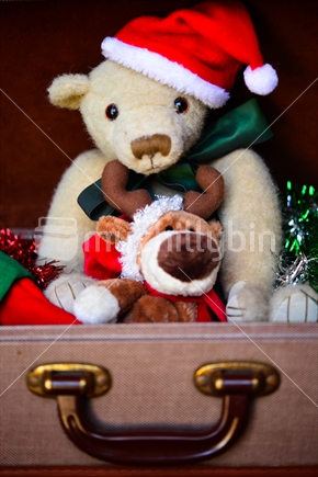 Old suitcase of christmas toys and decorations