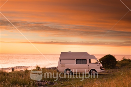 Van freedom camping on the Kaikoura coast at Sunrise