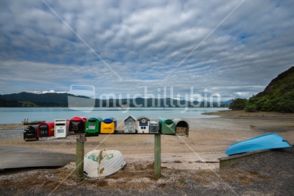 Many Mailboxes, situated in bay on the  Coromandel peninsular,  New Zealand 