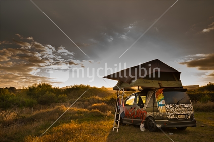 Wicked Camper at freedom camping site at Taupo - sunset