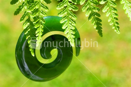 Greenstone and fern leaves
