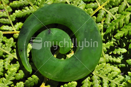 Greenstone on fern leaves