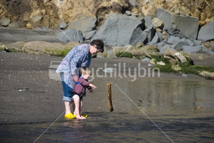 Grandmother introduces grandson to the sea